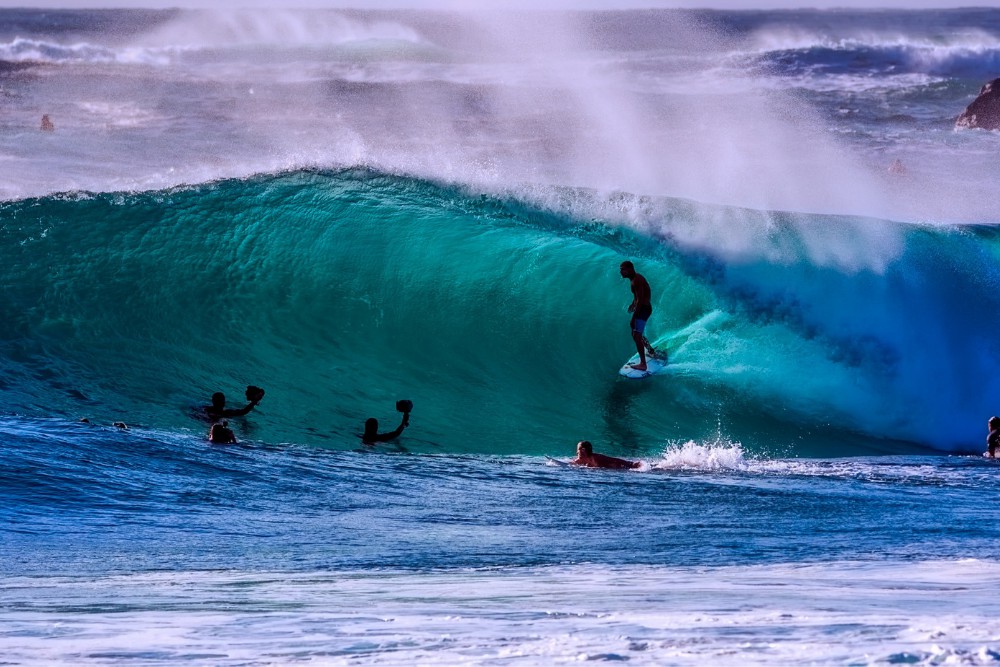 surfers-riding-waves