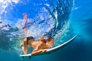 Surfer duck dive