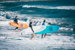 People with surfboards