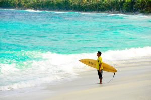 Man with pintail surfboard