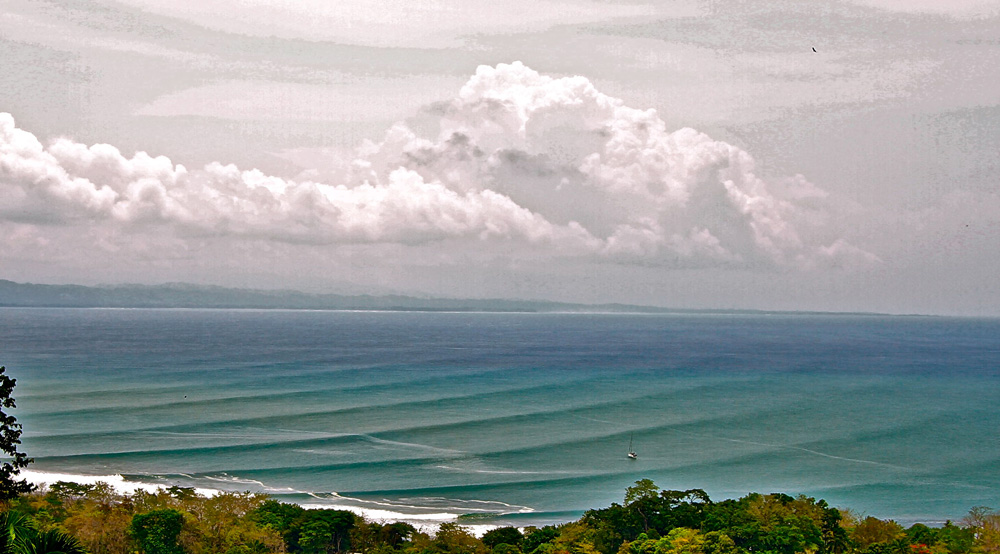 surf clouds over the blue ocean