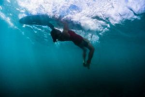 Surfer turtle roll