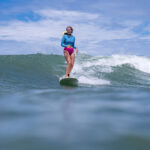 Our guest Tierney loves to surf while enjoying the health benefits of surfing in the ocean.