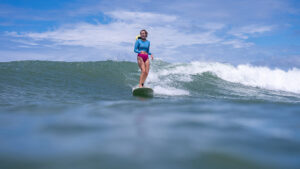 Our guest Tierney loves to surf while enjoying the health benefits of surfing in the ocean.