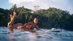Our guest Meagan, always a smile on her face, enjoying the mental health benefits of surfing
