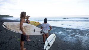 Surfer understanding ocean conditions and rip currents